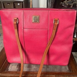 Pinky Red leather Dooney and Bourke in great condition